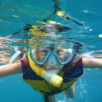Vivian, catching her first glimpse of the underwater world in Indonesia.