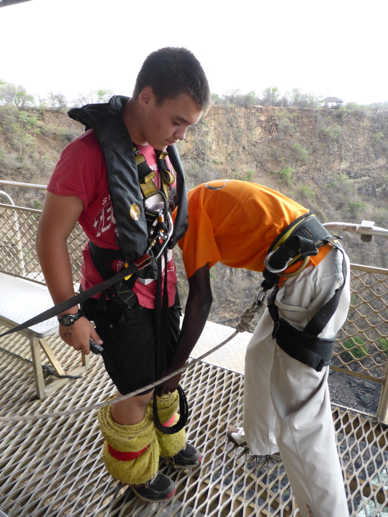 It wasn't all helmets and seat belts for us....David preparing to plummet from the 111 meter Victoria Falls Bungy